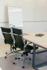 Detalle de respaldo y asiento de silla operativa Evolution Gris