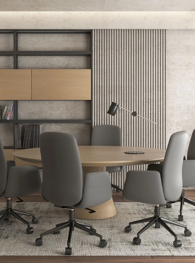 Sillón ejecutivo CALYNA PLUS gris en espacio de oficina